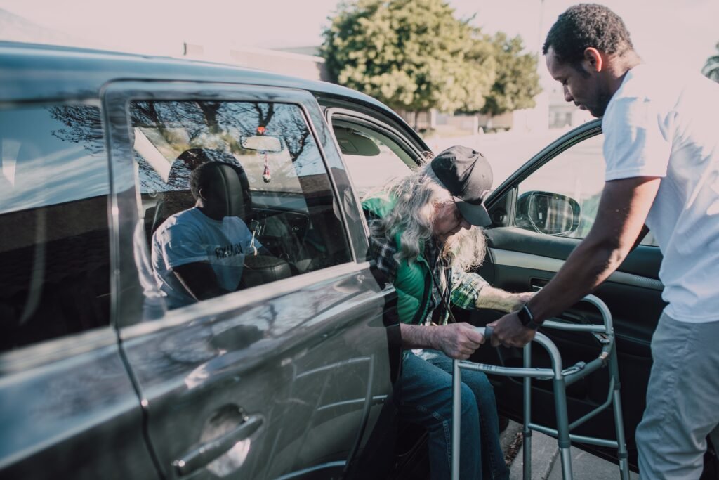 Older adult using transportation services available through senior resources in Polk County